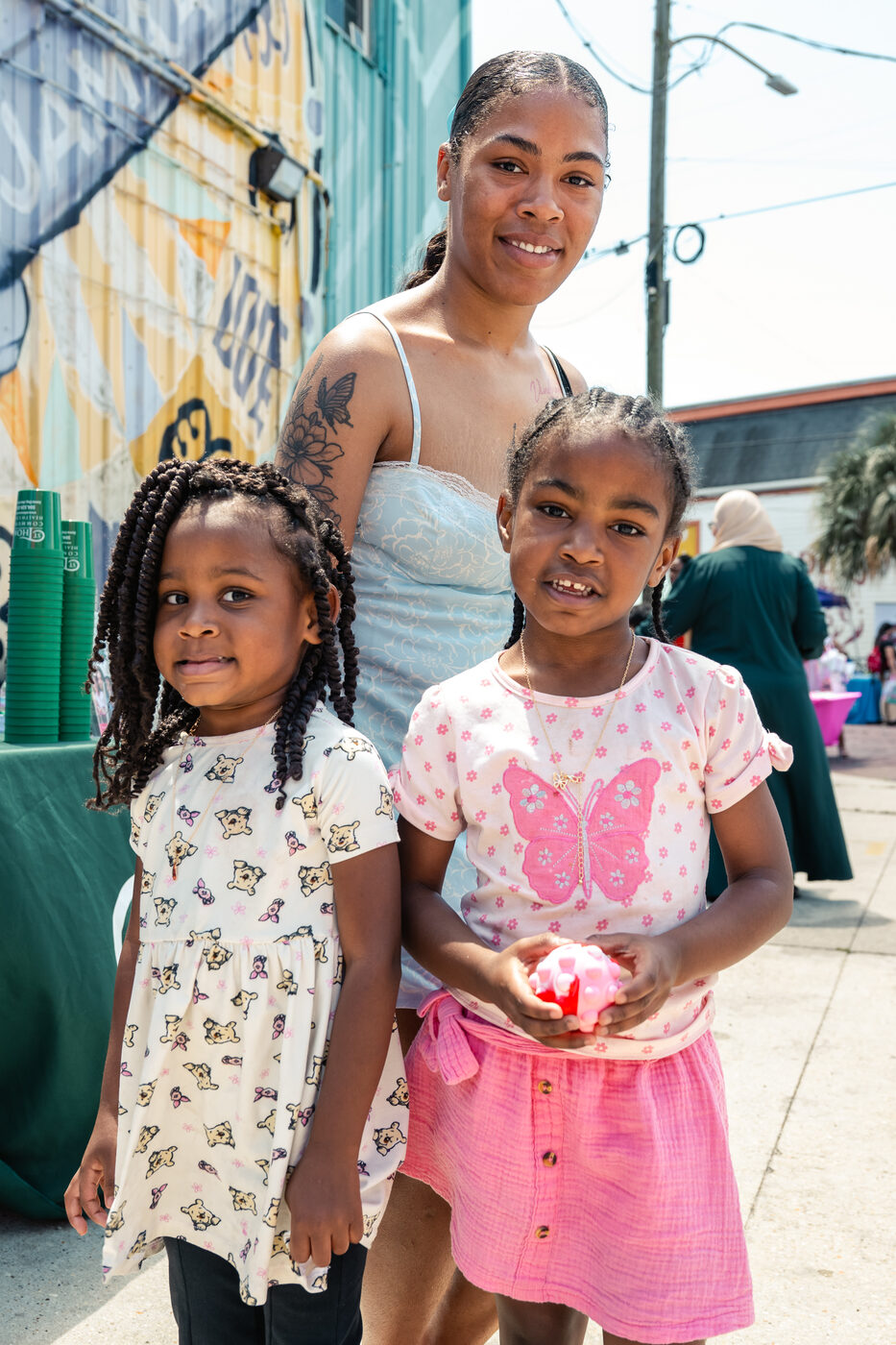A mother with her two daughters on Bayou Road